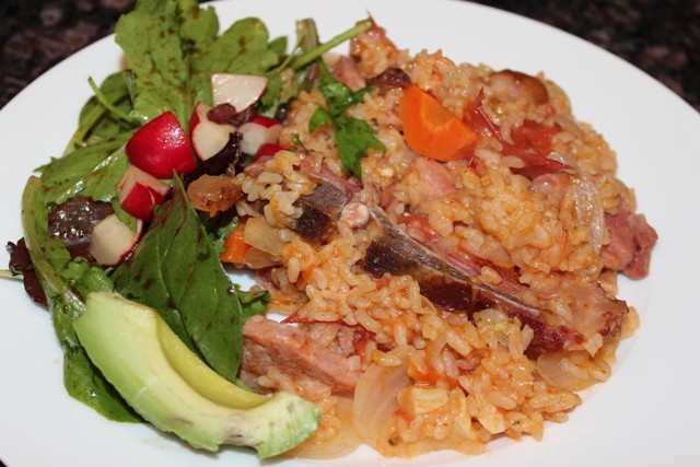 Rice with smoked pork chops (locrio de chuleta ahumada)
